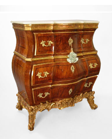 DANISH ROCOCO WALNUT AND PARCEL GILT COMMODE