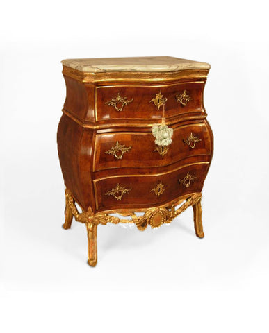 NORWEGIAN ROCOCO WALNUT AND PARCEL GILT COMMODE