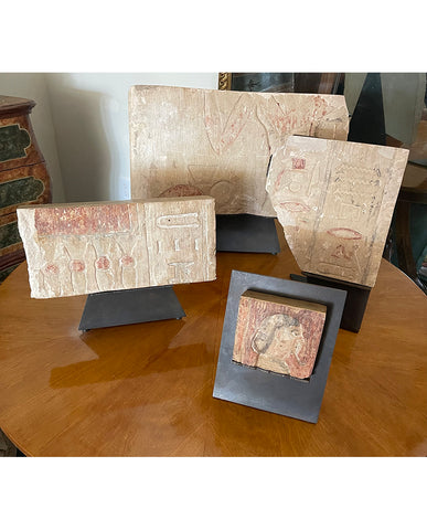 SET OF FOUR EGYPTIAN LIMESTONE PAINTED FRAGMENTS