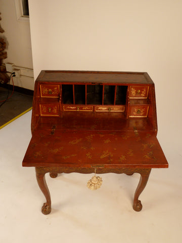 CHINESE EXPORT RED LACQUER AND DECORATED FALL-FRONT BUREAU ON STAND