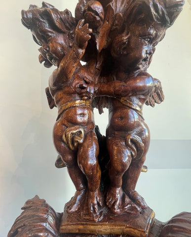 ITALIAN LATE BAROQUE CARVED WOOD  AND PARCEL GILT "CANDELABRO"