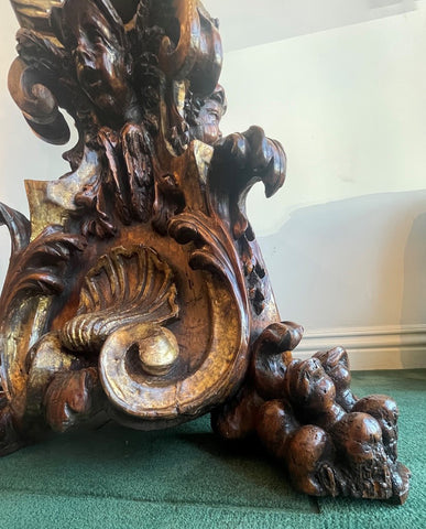 ITALIAN LATE BAROQUE CARVED WOOD  AND PARCEL GILT "CANDELABRO"