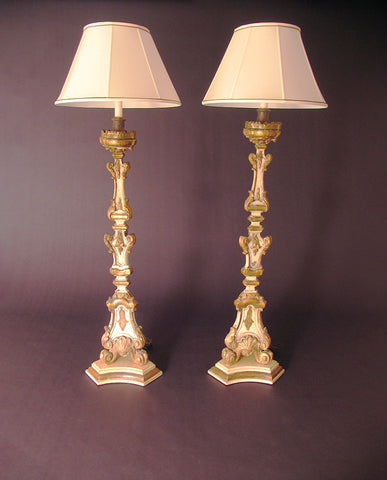 PAIR ITALIAN BAROQUE PAINTED AND PARCEL GILT CANDLESTICKS