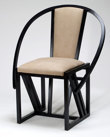 FRENCH EBONIZED AND LEATHER ARMCHAIR